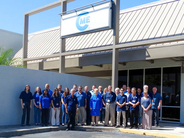 Custom Manufacturing & Engineering Employees and Facility company photo building